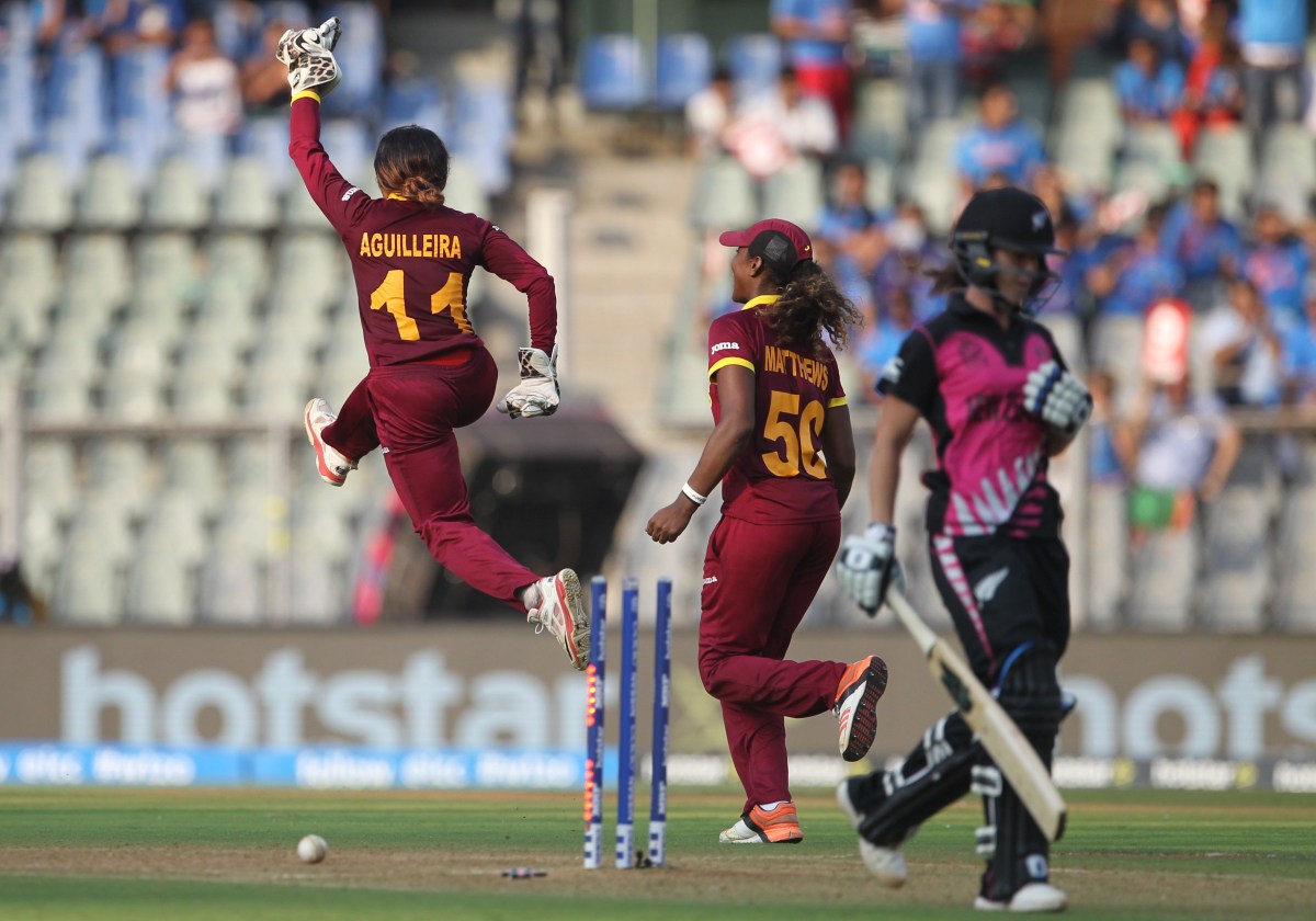 West Indies' cricketers celebrate after winning their match against New Zealand during their ICC Women's World Twenty20 2016 cricket semi-final at the Wankhede stadium in Mumbai, India, Wednesday, March 31, 2016. (AP Photo/Rafiq Maqbool)