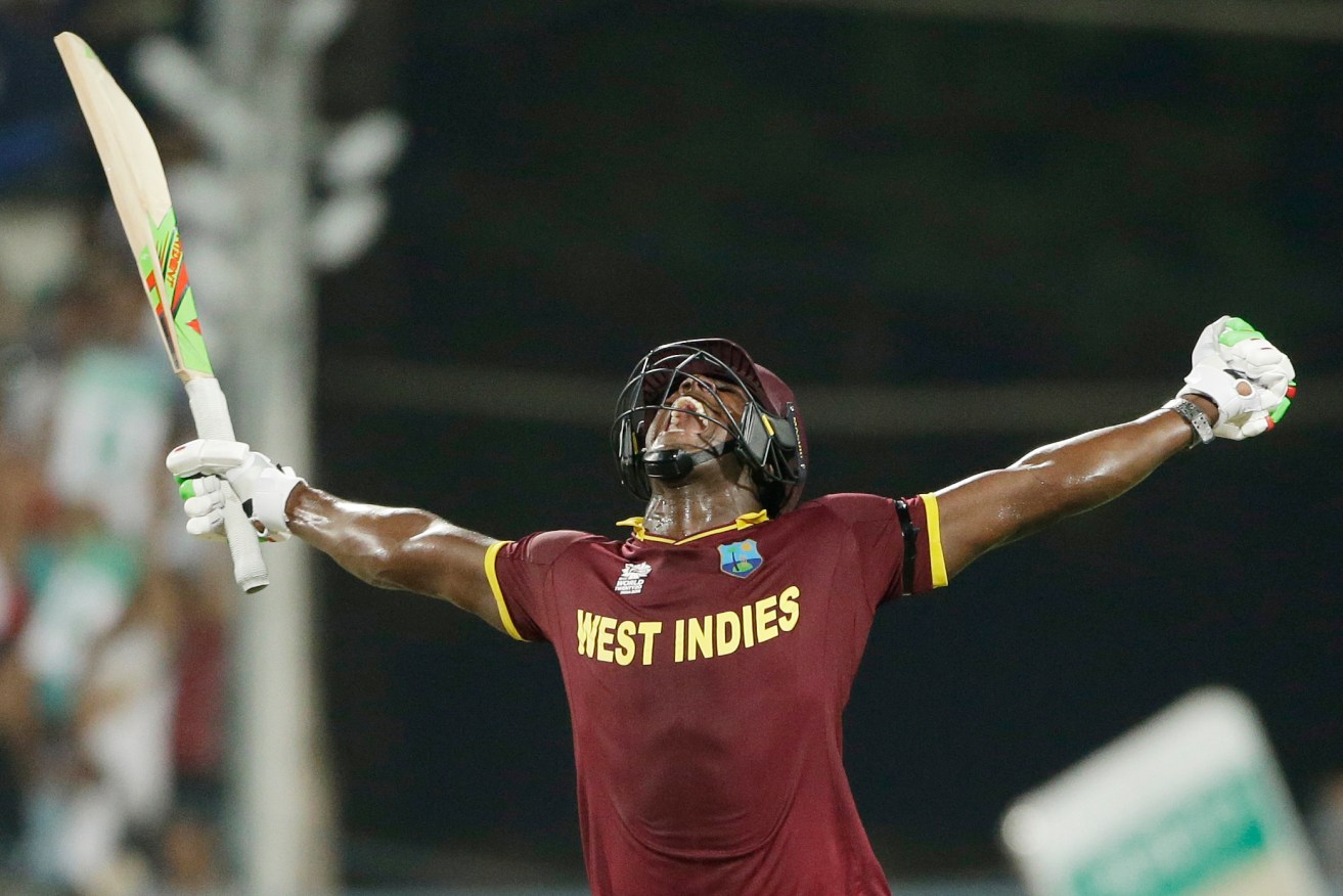 Carlos Brathwaite celebrates after hitting the winning runs in the World T20 final. Photo: Saurabh Das, AP.