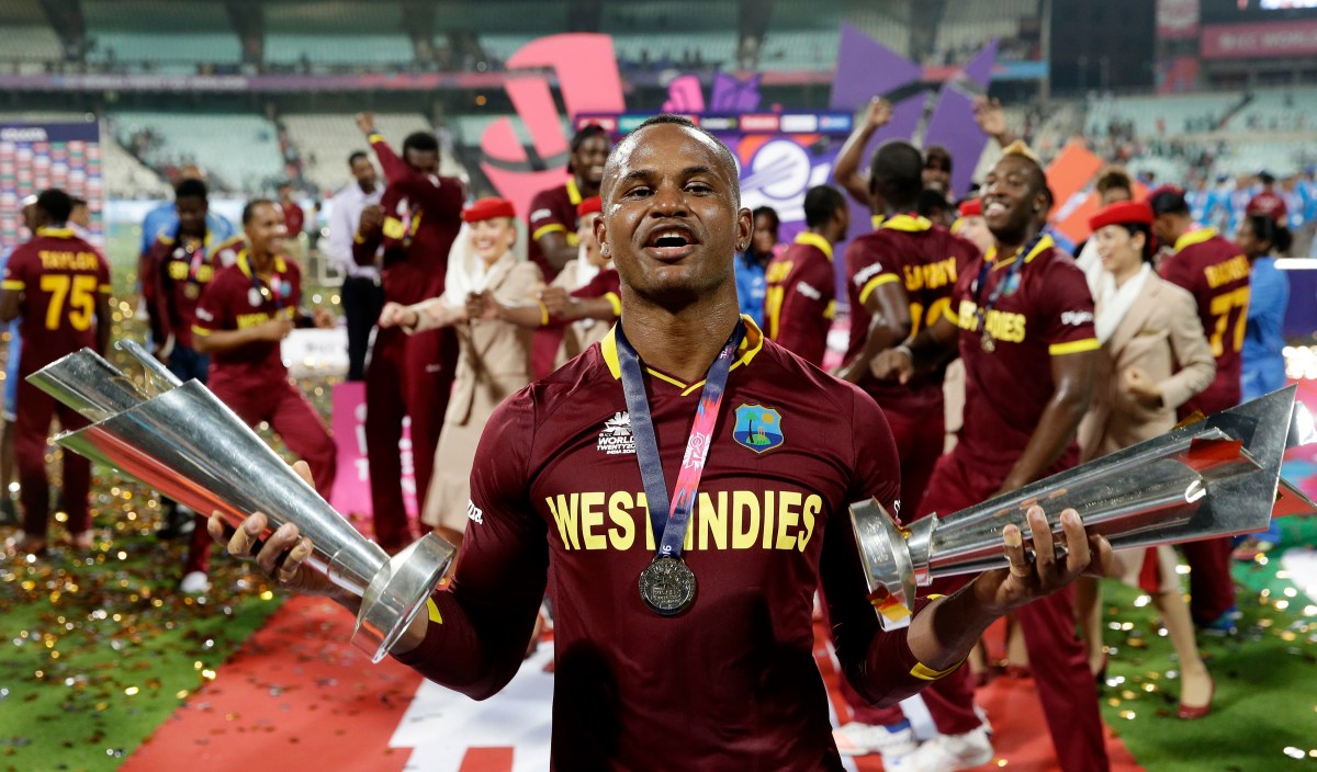 West Indies Marlon Samuels celebrates after his team's win over Engalnd in the final of the ICC World Twenty20 2016 cricket tournament at Eden Gardens in Kolkata, India, Sunday, April 3, 2016. (AP Photo/Saurabh Das)