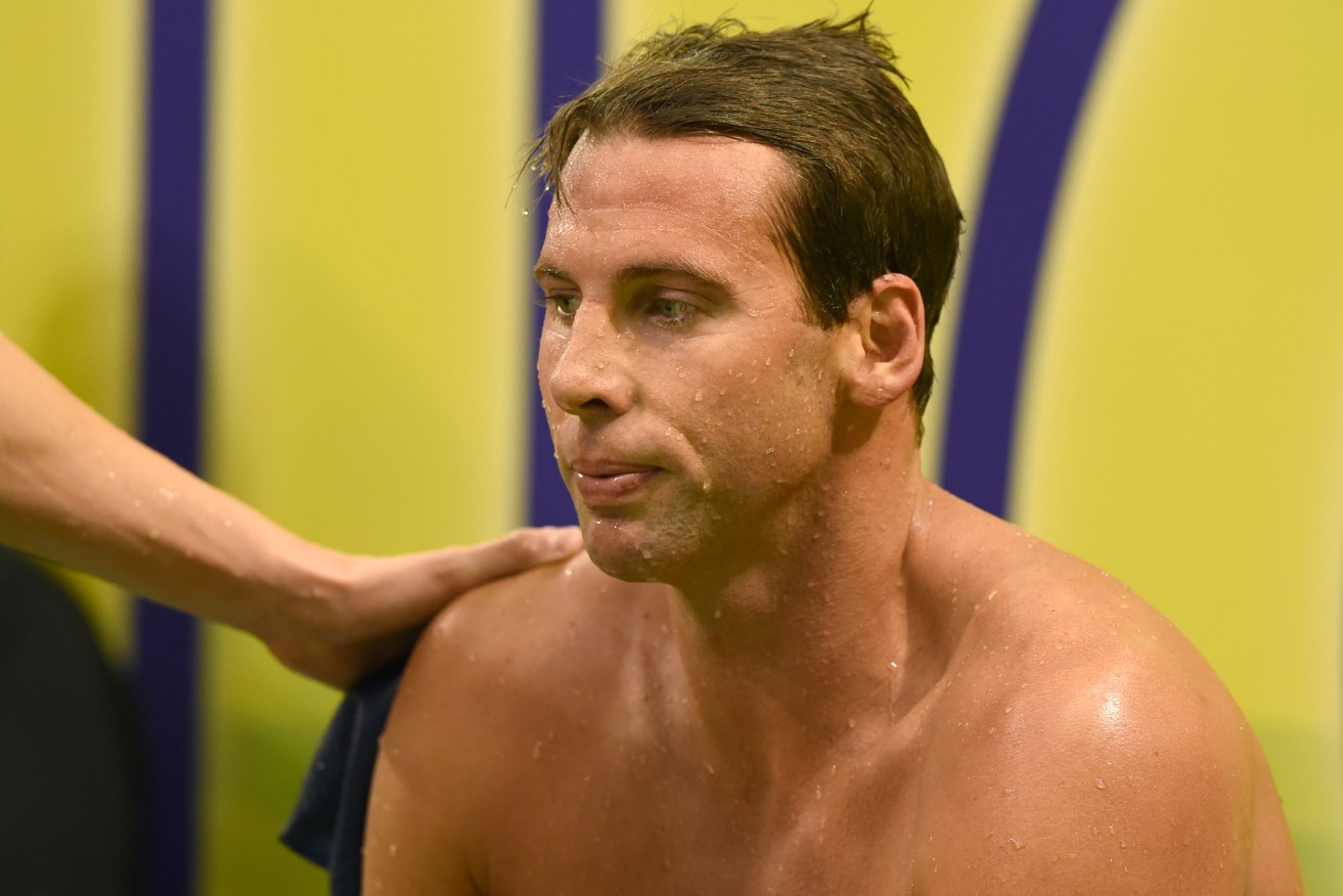 Grant Hackett recovers after swimming in the Mens 400m Freestyle Final at the Adelaide trials. Photo: Dave Hunt, AAP.