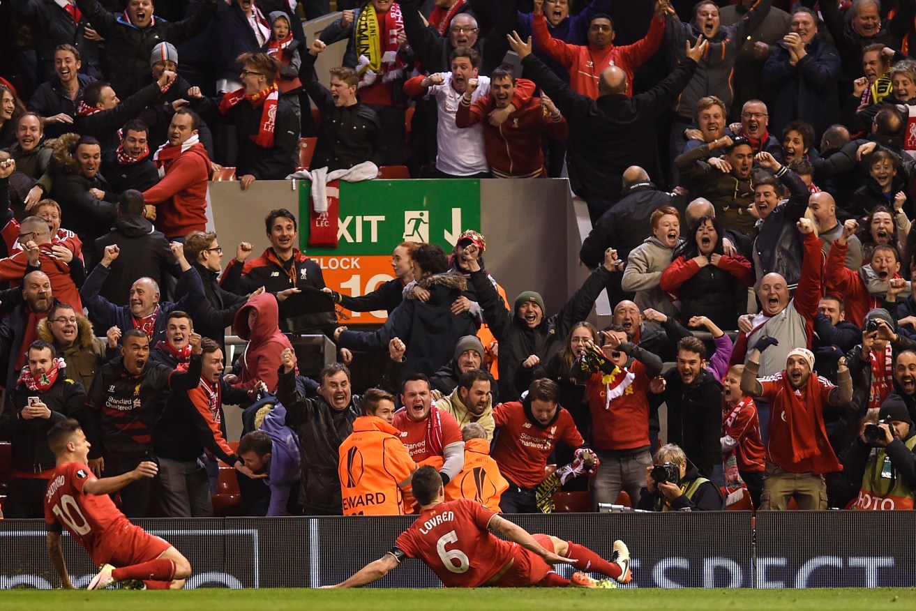 Liverpool's Dejan Lovren (centre) celebrates after scoring against Borussia Dortmund. Photo: EPA/PETER POWELL