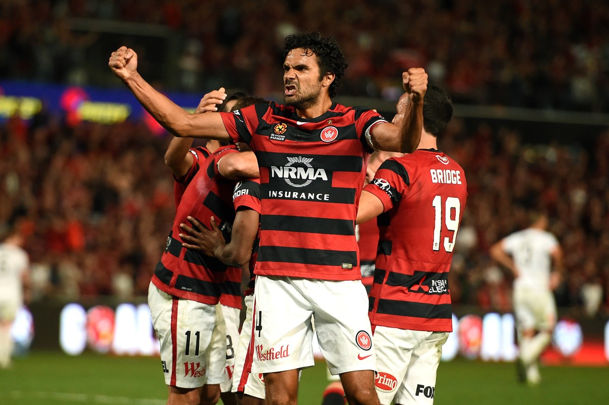 Nikolai Topor-Stanley of the Wanderers gestures to the crowd after Romeo Castelen scored his third goal during the A-League semi-final between the Western Sydney Wanderers and the Brisbane Roar at Pirtek Stadium in Sydney, Sunday, April 24, 2016. (AAP Image/Dan Himbrechts) NO ARCHIVING, EDITORIAL USE ONLY