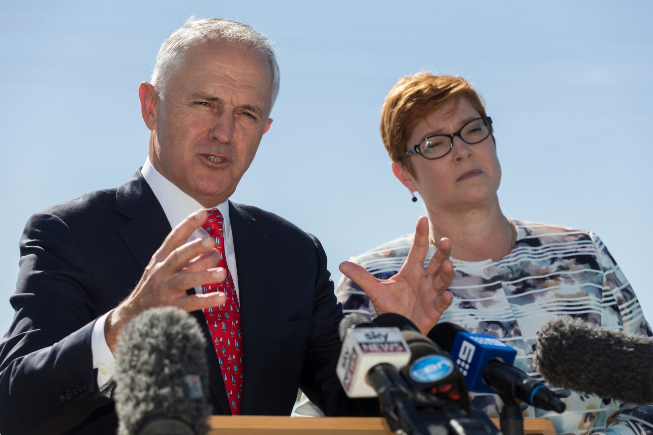 Malcolm Turnbull at yesterday's subs announcement, flanked by Marise Payne. Photo: Ben Macmahon, AAP.
