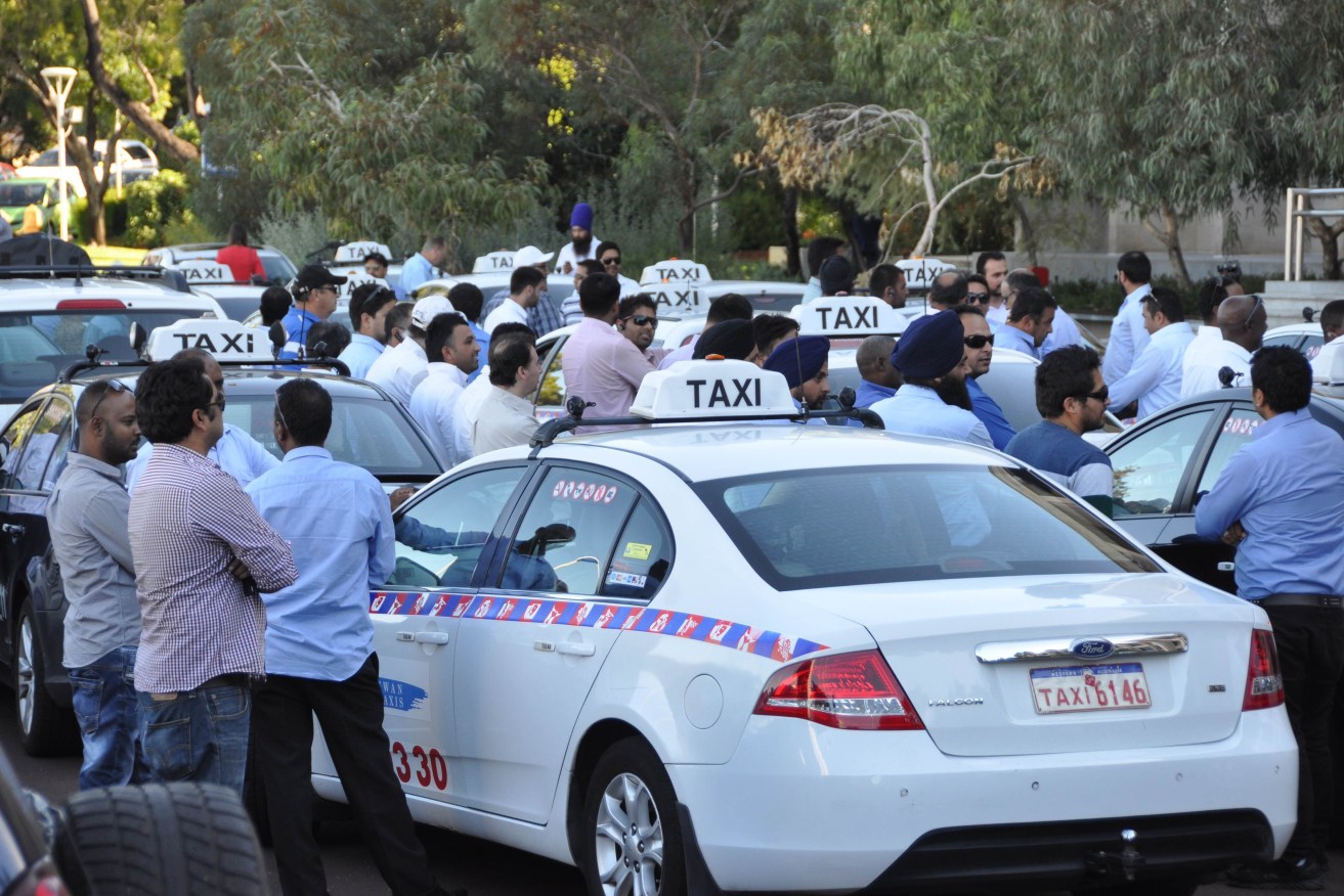 Perth taxi drivers protest against Uber. Photo: AAP/Sarah Motherwell