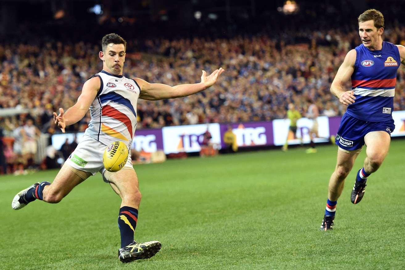 Coach Don Pyke isn't expecting repercussions from the Crows' Elimination Final win over the Bulldogs, but he does expect Taylor Walker - here setting up the match-winner - to return to the form he showed in that game.  Photo: Julian Smith, AAP.
