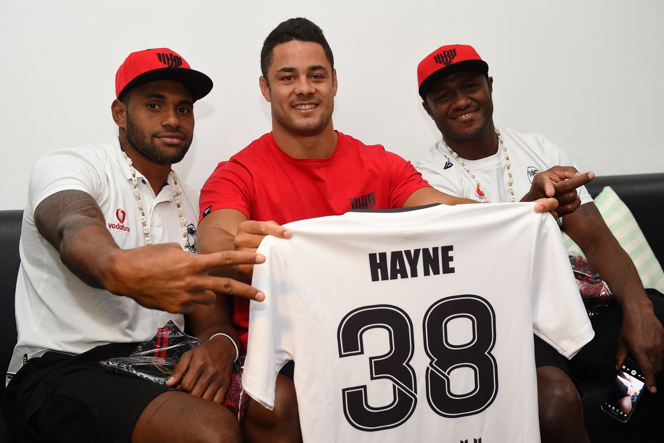 Jarryd Hayne meeting Flying Fijian rugby sevens players Semi Kunatani (left) and Pio Tuwai in Sydney in February. Photo: Dan Himbrechts, AAP.