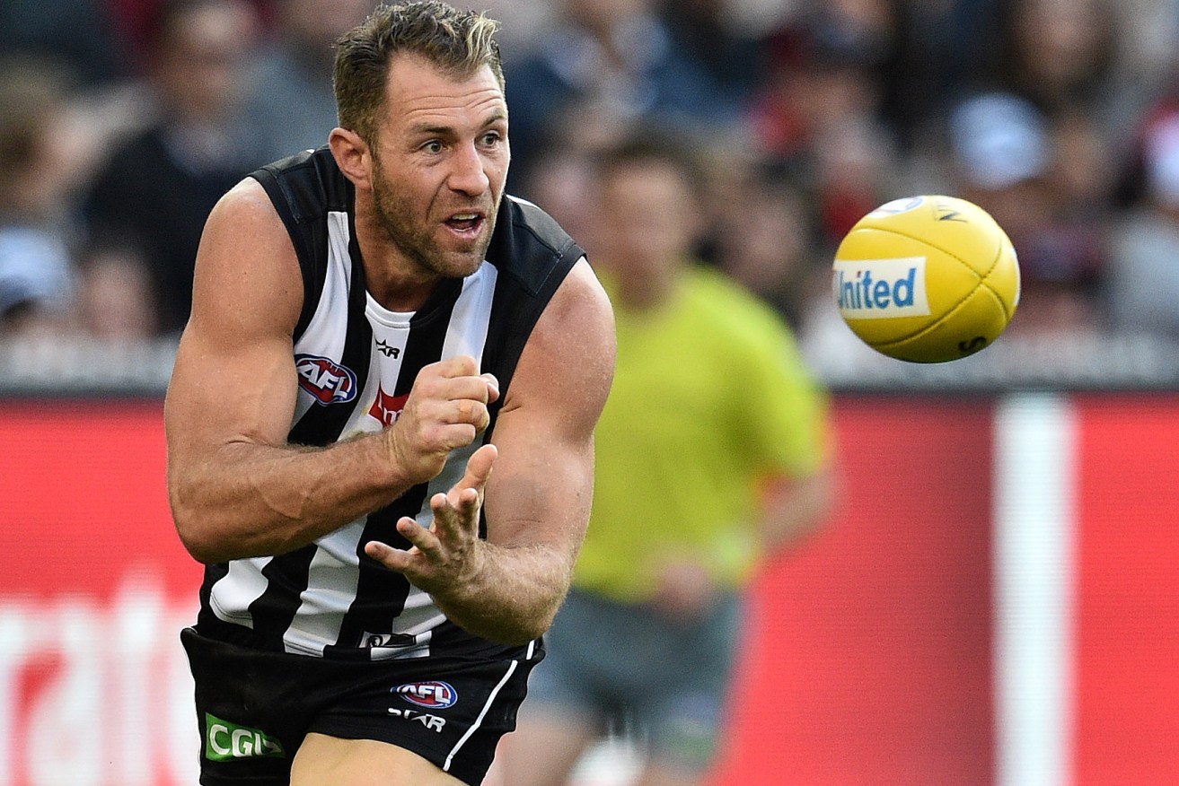 Travis Cloke in action against the Demons before he was dropped. Photo: Julian Smith, AAP.
