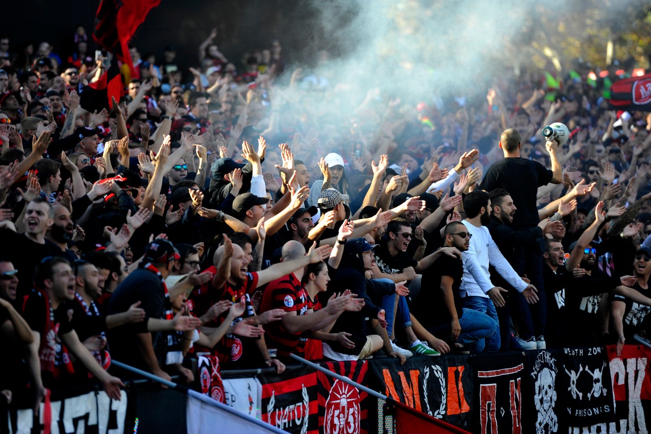 Wanderers fans during the A-League Grand Final between Adelaide United and Western Sydney. Photo: David Mariuz, AAP.