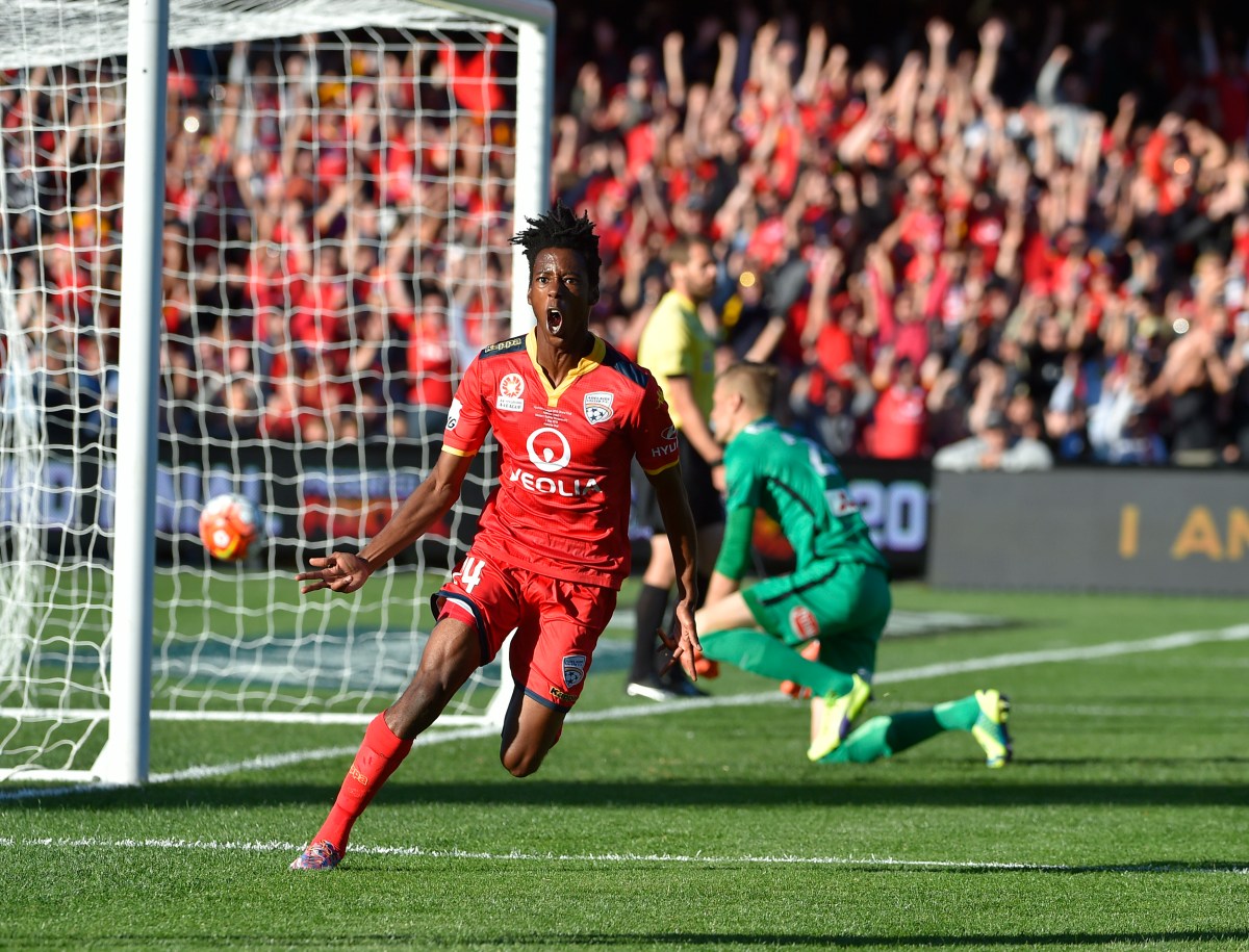 Bruce Kamau of United reacts after scoring during the A-League Grand Final between Adelaide United and the Western Sydney Wanderers at Adelaide Oval in Adelaide, Sunday, May 1, 2016. (AAP Image/David Mariuz) NO ARCHIVING, EDITORIAL USE ONLY