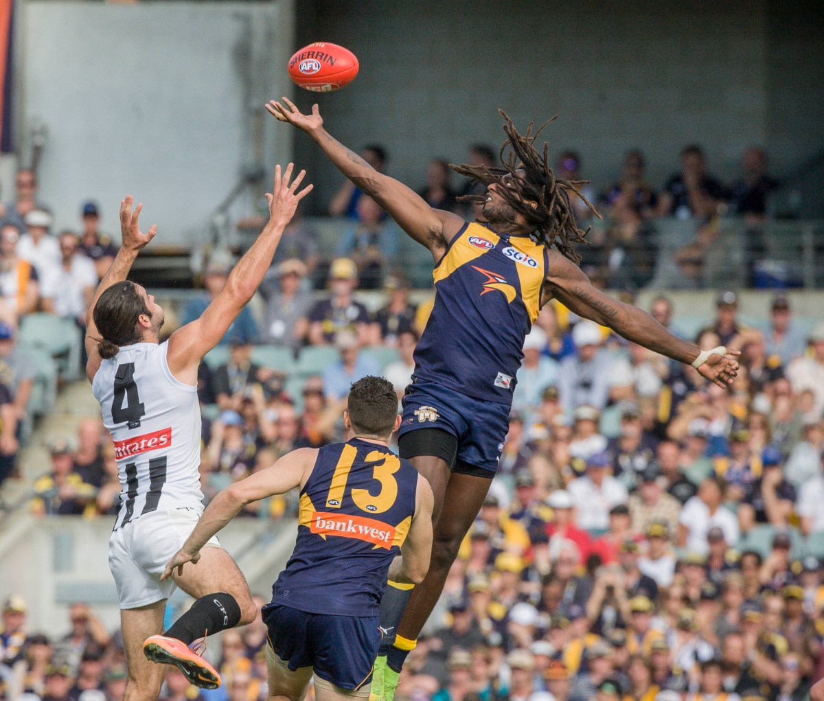 Brodie Grundy of Collingwood and Nic Naitanui of the West Coast Eagles during the round 6 AFL match between the West Coast Eagles and the Collingwood Magpies at Domain Stadium in Perth, Sunday, May 1, 2016. (AAP Image/Tony McDonough) NO ARCHIVING, EDITORIAL USE ONLYNLY