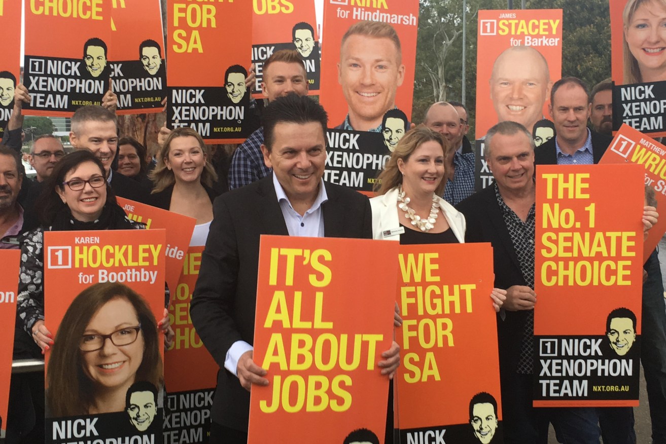 Nick Xenophon with his candidates. Photo: AAP/Michael Ramsey