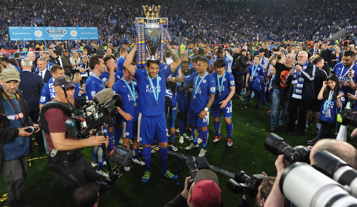 epa05294573 Leicester City's Leonardo Ulloa lifts the Premier League trophy after the English Premier League match between Leicester City and Everton at the King Power stadium Leicester in Leicester, Britain, 07 May 2016. EPA/PETER POWELL EDITORIAL USE ONLY. No use with unauthorized audio, video, data, fixture lists, club/league logos or 'live' services. Online in-match use limited to 75 images, no video emulation. No use in betting, games or single club/league/player publications