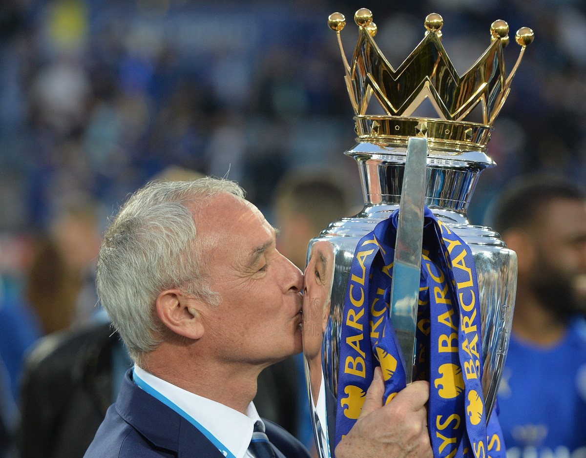 epaselect epa05294451 Leicester City manager Claudio Ranieri kisses the Premier League trophy after the English Premier League match between Leicester City and Everton at the King Power stadium Leicester in Leicester, Britain, 07 May 2016.  EPA/PETER POWELL EDITORIAL USE ONLY. No use with unauthorized audio, video, data, fixture lists, club/league logos or 'live' services. Online in-match use limited to 75 images, no video emulation. No use in betting, games or single club/league/player publications