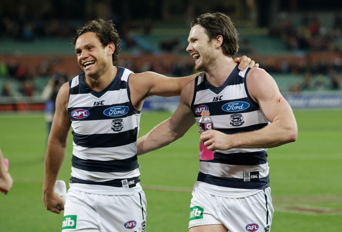 Does he ever stop smiling? Patrick Dangerfield and Steven Motlop share a laugh at the Crows' expense. Photo: Ben Macmahon, AAP.