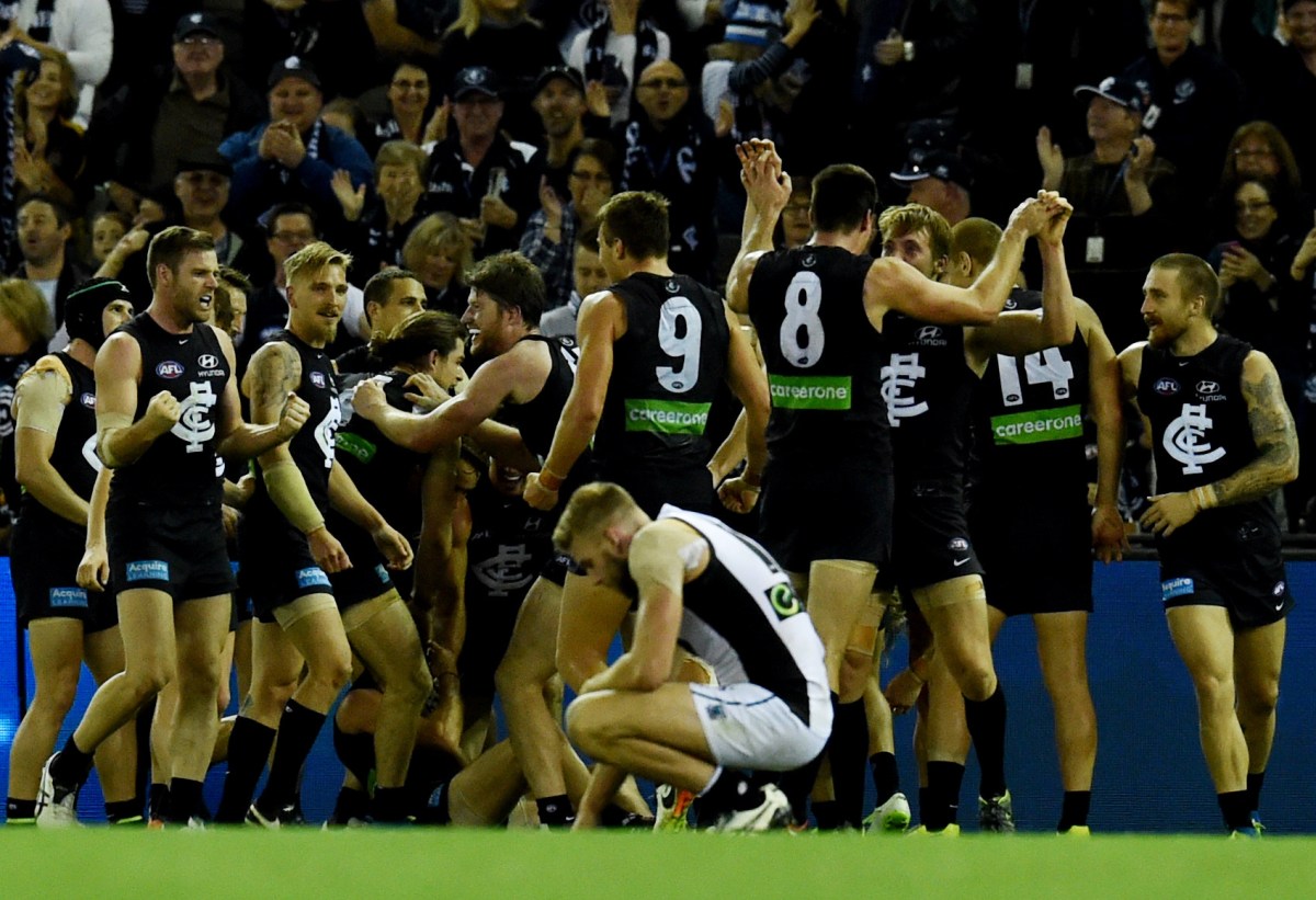 Carlton celebrate their win after the Round 8 AFL match between the Carton Blues and the Port Adelaide Power at Etihad Stadium in Melbourne, Saturday, May 15, 2016. (AAP Image/Tracey Nearmy) NO ARCHIVING, EDITORIAL USE ONLY