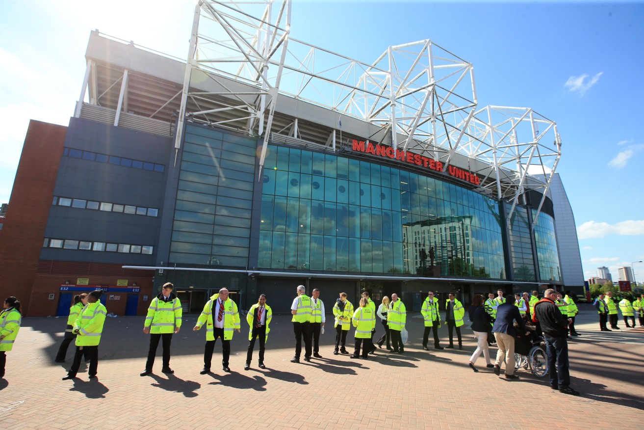 A security cordon around Old Trafford after the game was abandoned. Photo: Mike Egerton, PA Wire. 