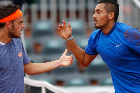 “Good guy” Kyrgios enlivens damp day at French Open
