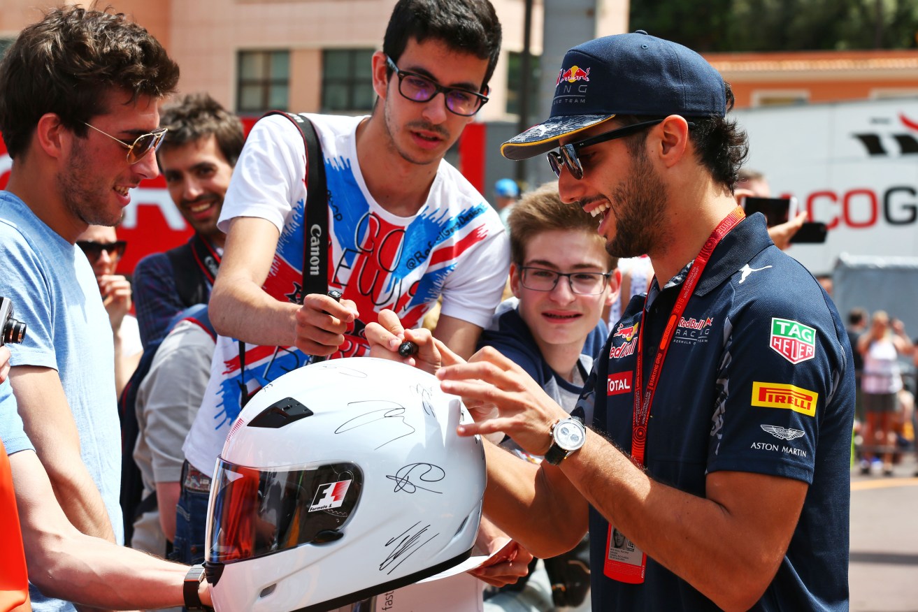 Daniel Ricciardo signs autographs for fans in Monaco. Photo: XPB/Press Association Images.