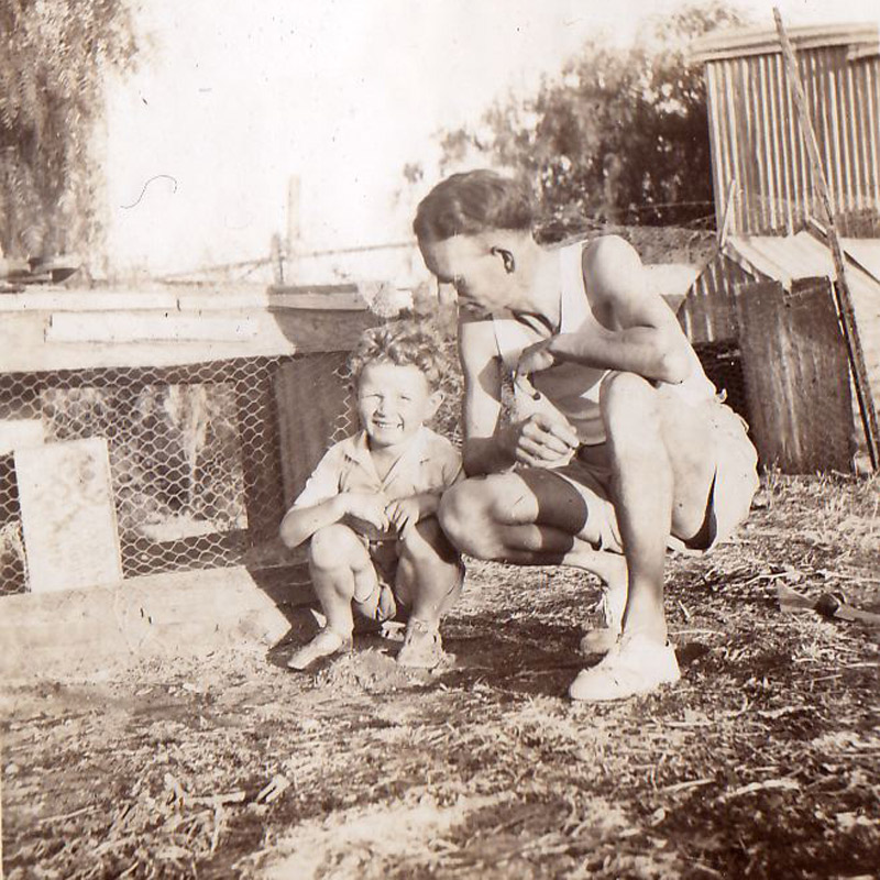 Tony Andrews and his dad Frank in Gulnare, complete with chook house and galv shed, in 1947.