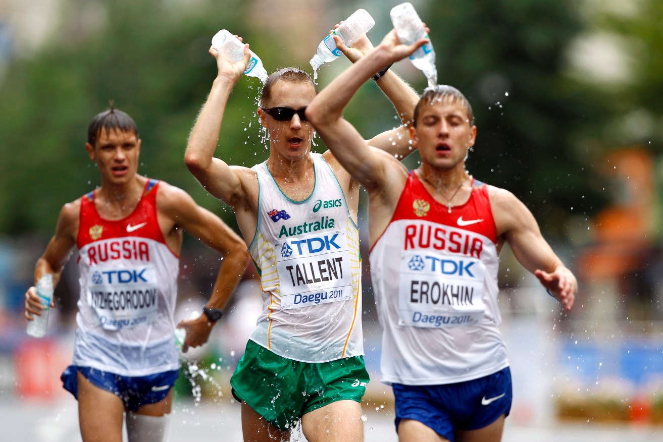 Denis Nizhegorodov competes against countryman Igor Erokhin and Australian Jared Tallent in the 2011 IAAF World Championships. Tallent was last week handed an Olympic Gold medal after his opponent in the 2012 London Olympics 50km walk, Sergey Kirdyapkin, was stripped of his first place finish. Photo: NIC BOTHMA, EPA.