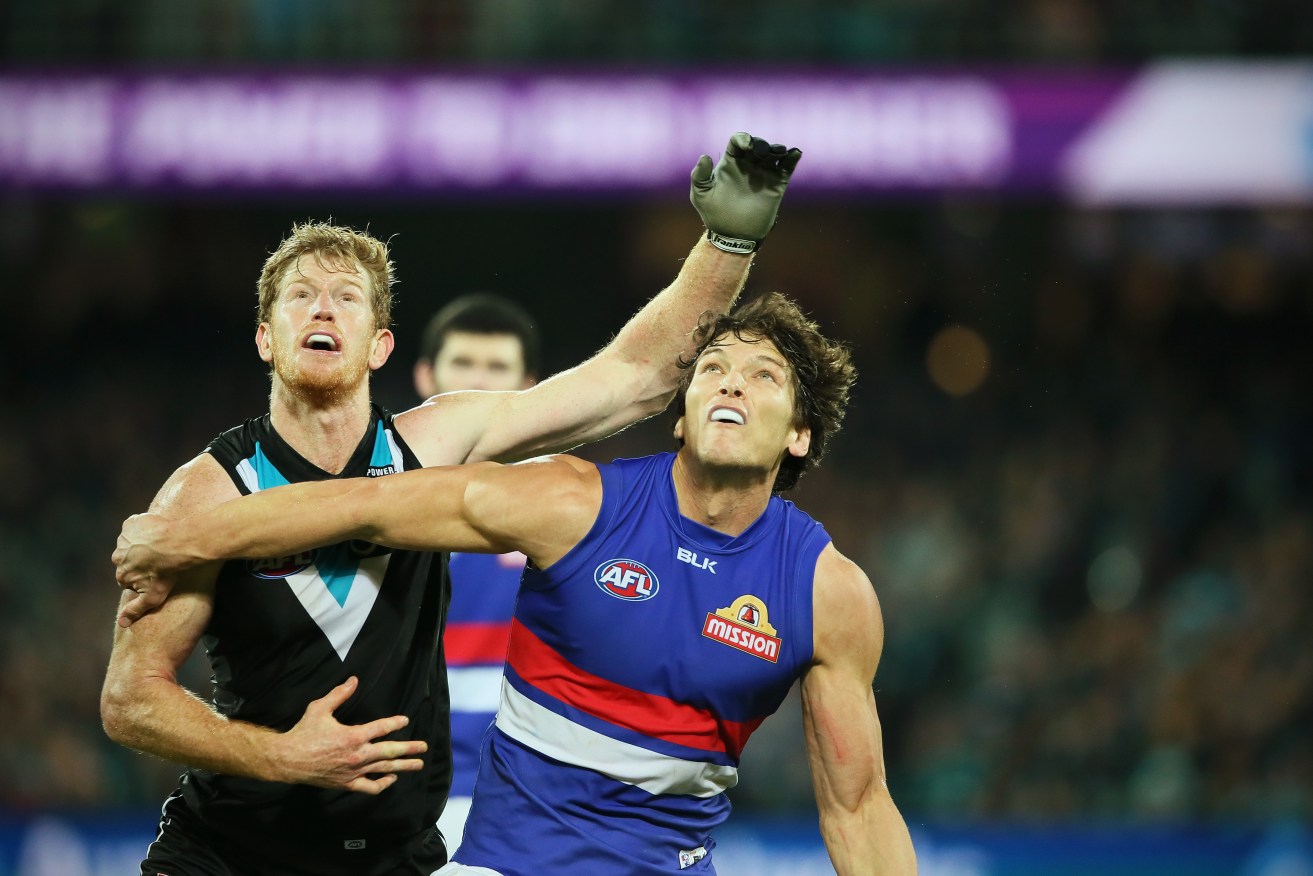 Will Minson tussles with Port Adelaide's Matthew Lobbe last year. 2016 has not turned out well for either of them thus far. Photo: Ben Macmahon, AAP.