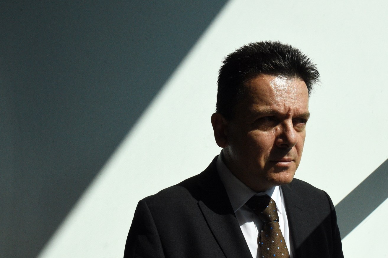 "When he comes on the telly I turn off": The priest named under privilege by Nick Xenophon says he feels angry when he sees the Senator's election posters. Photo: Mick Tsikas, AAP