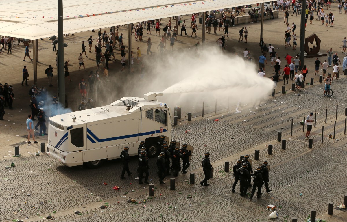 Police fire water cannons to control the fighting after football fans clashed ahead of the England vs Russia France Euro 2016 match.. Picture date: Saturday June 11, 2016. See PA story SPORT Euro2016. Photo credit should read: Niall Carson/PA Wire