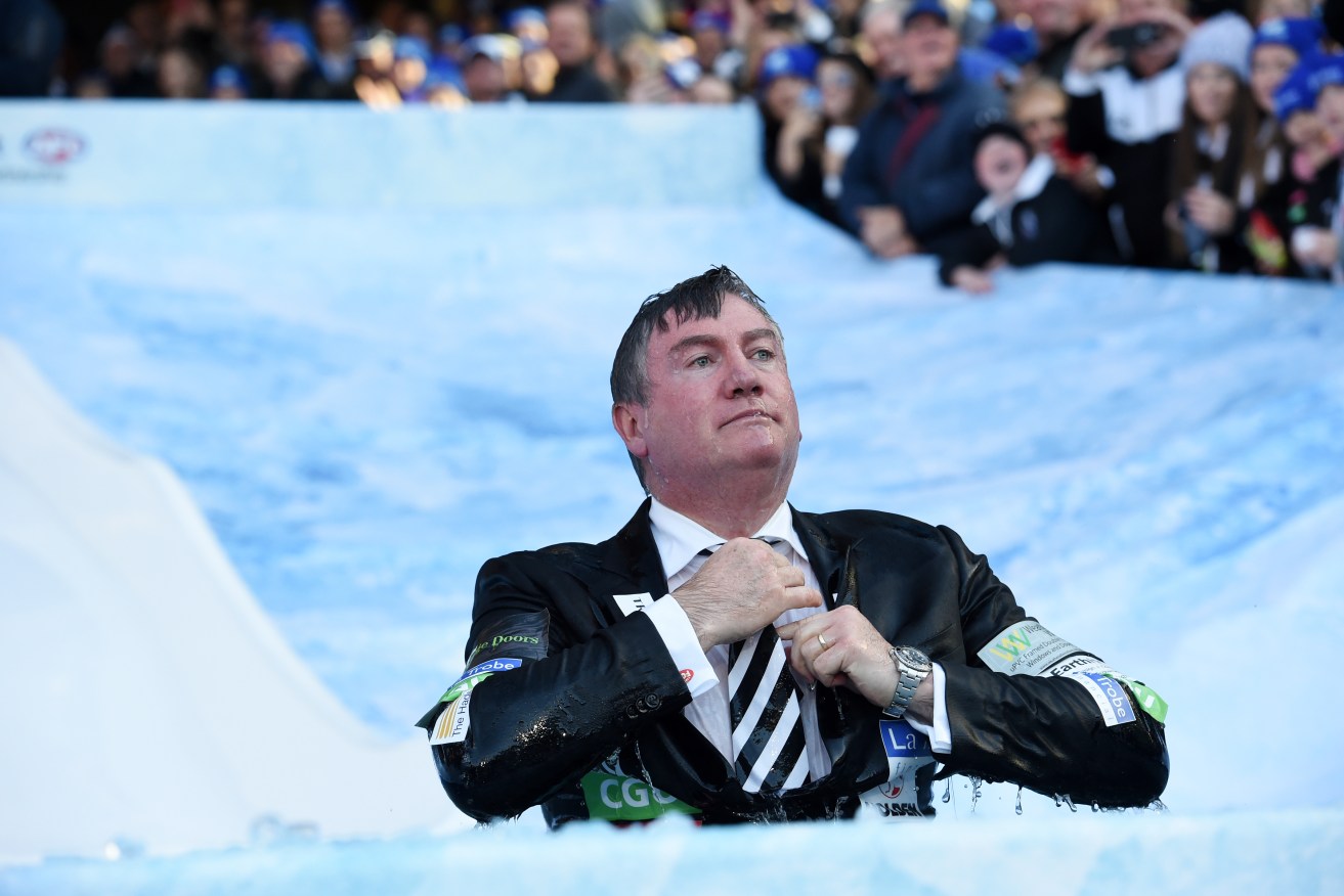 Collingwood president Eddie McGuire takes part in the Big Freeze Ice Slide challenge to raise funds for Motor Neurone Disease before last week's match between Collingwood and Melbourne. Photo: Tracey Nearmy, AAP.