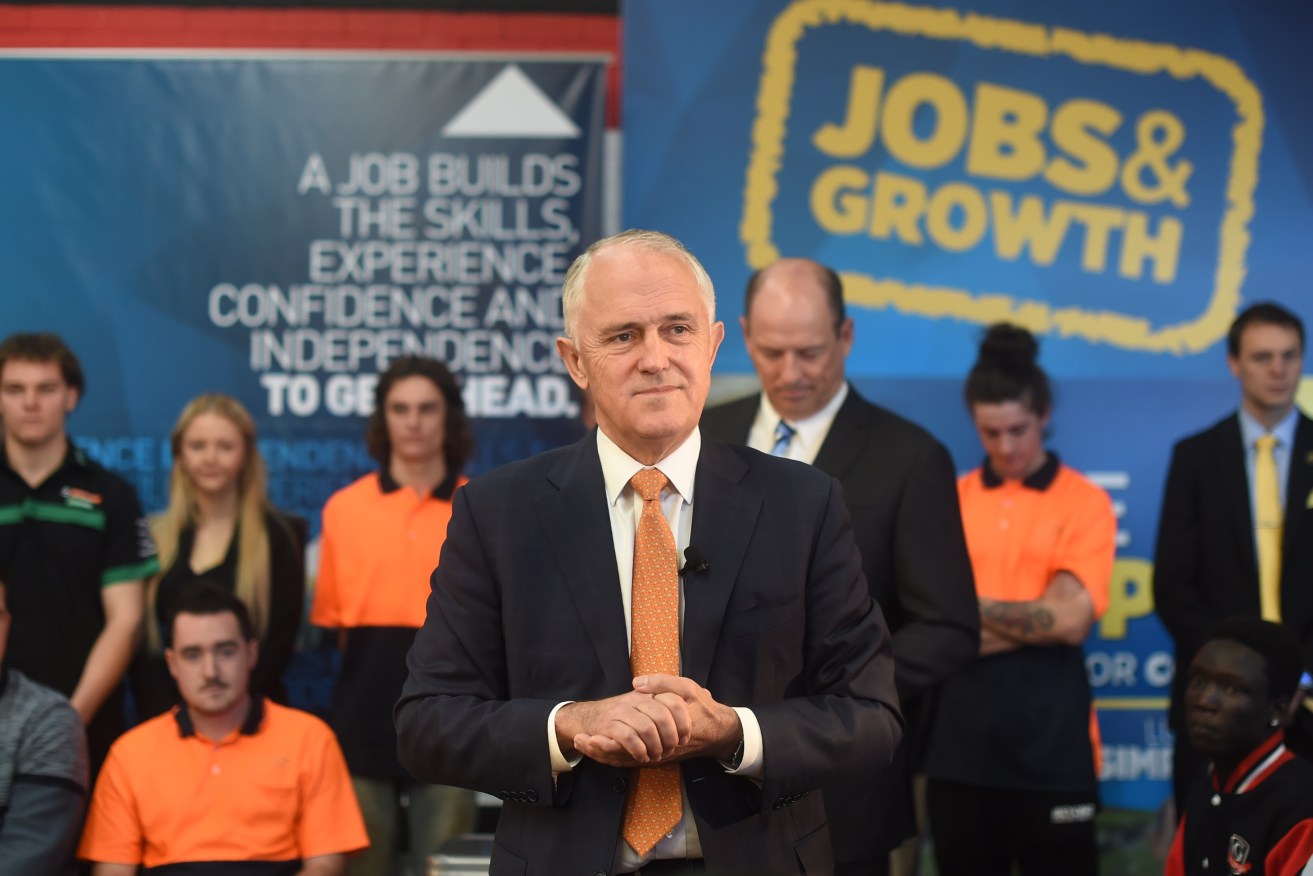 Malcolm Turnbull speaks to young locals during a youth employment forum in Perth. Photo: Lukas Coch, AAP.