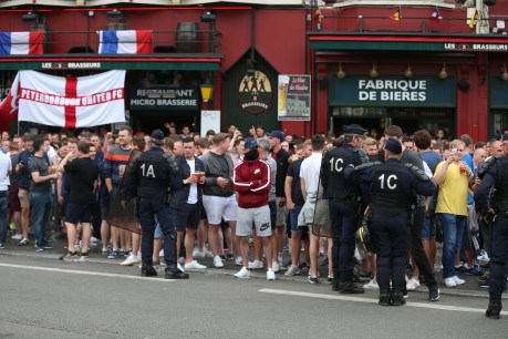 Dozens arrested as police clash with fans ahead of England match