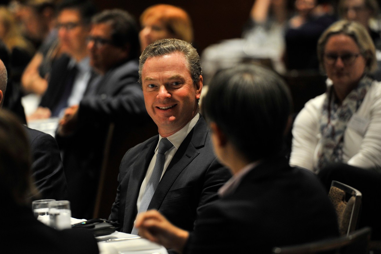 Minister for Innovation, Industry and Science Christopher Pyne (centre) and Labor Senator and Leader of the Opposition in the Senate Penny Wong (right) chat before taking part in a federal election debate with  at the CEDA conference in Adelaide, yesterday. Photo: AAP/David Mariuz.
