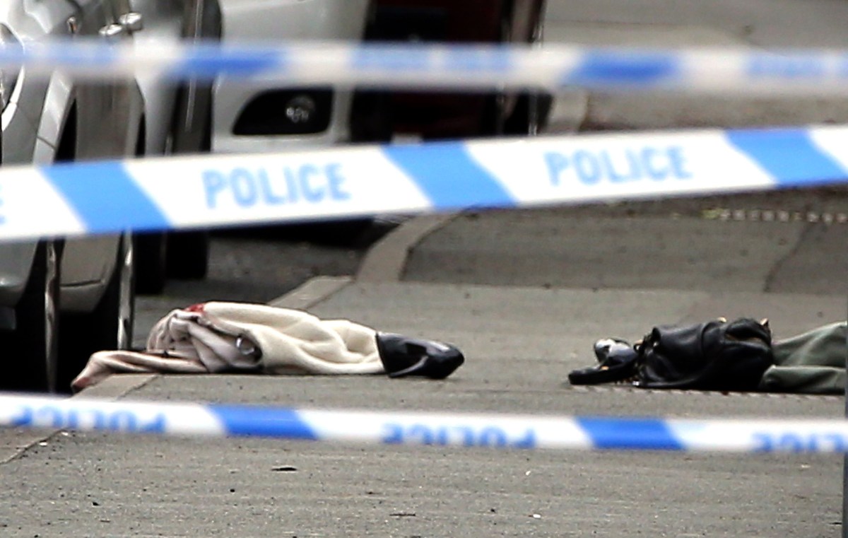 Items on the ground at the scene in Birstall, West Yorkshire, after Labour MP Jo Cox was shot and injured in an attack near Leeds.. Picture date: Thursday June 16, 2016. An eyewitness said the 41-year-old mother of two was left lying in a pool of blood on the pavement after her assailant struck in Birstall. See PA story POLICE MP. Photo credit should read: Nigel Roddis/PA Wire