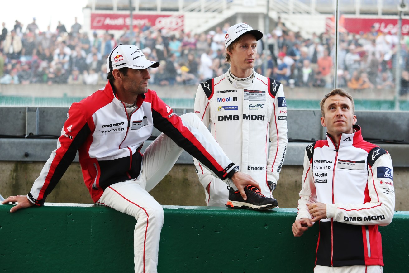 Mark Webber with teammates Brendon Hartley and Timo Bernhard. AAP Photo.