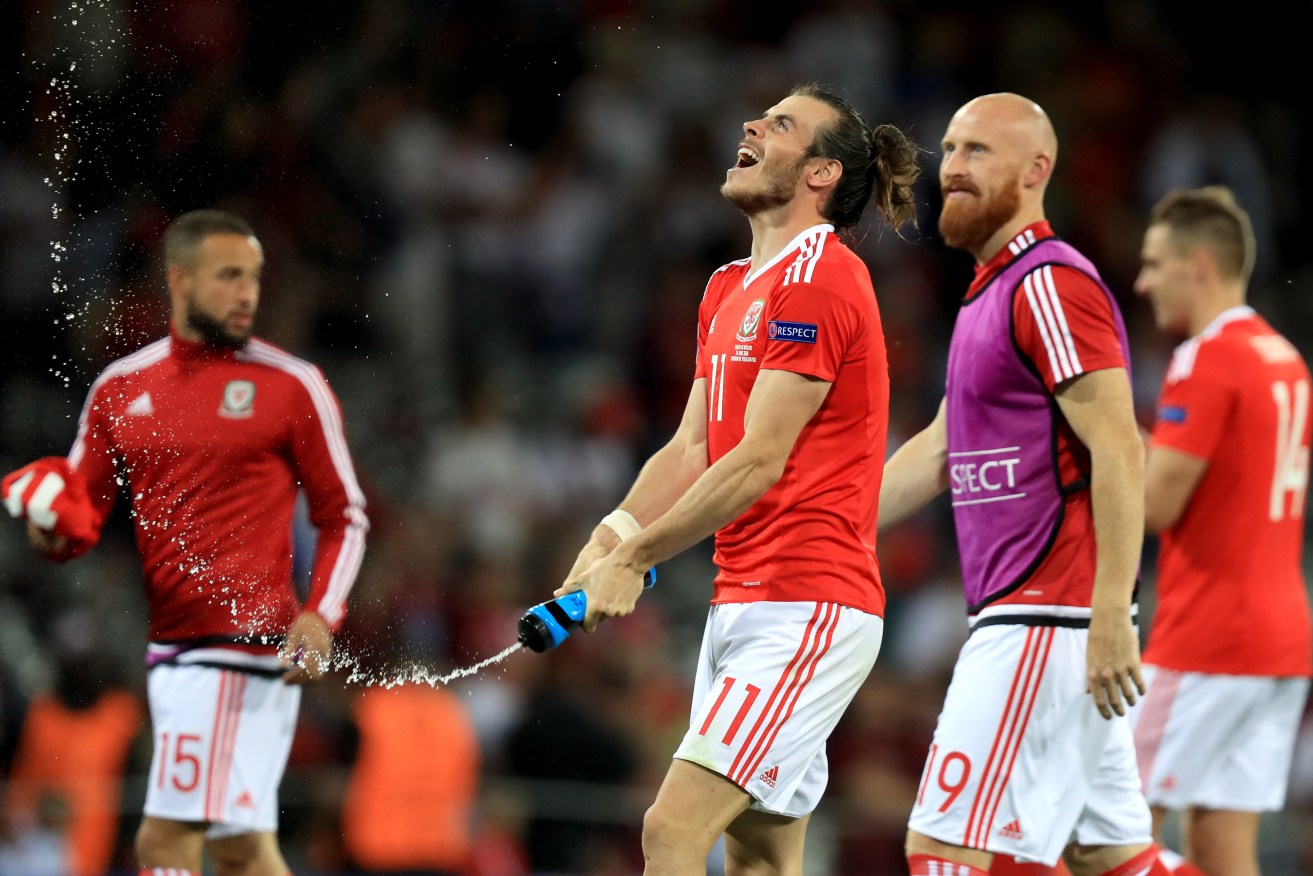 Wales' Gareth Bale celebrates victory over Russia after the final whistle. Photo: Mike Egerton, PA Wire. 