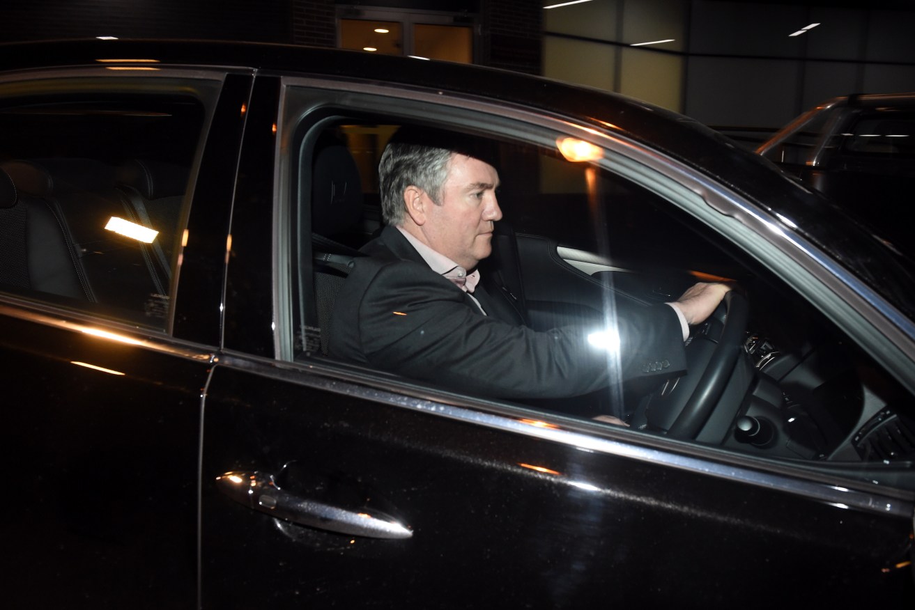 Eddie McGuire, leaving Collingwood's headquarters this week, will not take up his commentary duties tonight. Photo: Tracey Nearmy, AAP.