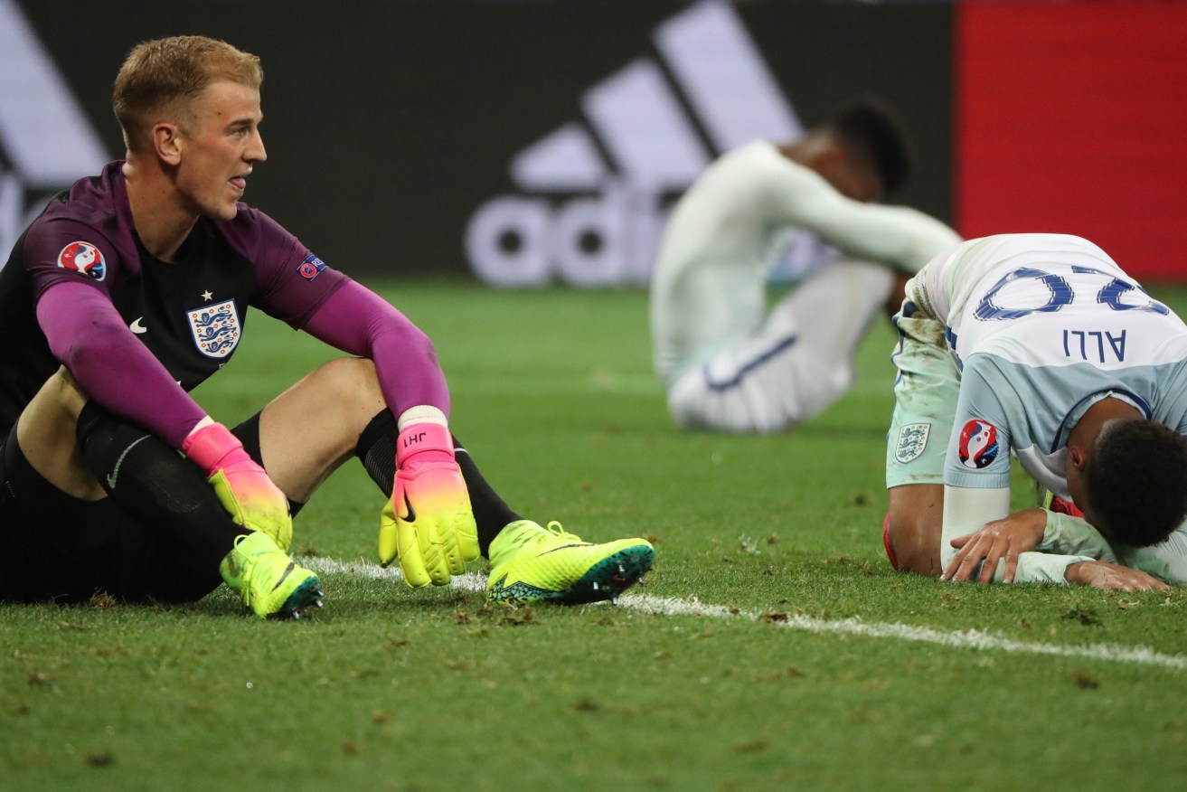 England goalkeeper Joe Hart despondent after his side's 2-1 loss to Iceland. Photo: OLIVER WEIKEN, EPA.