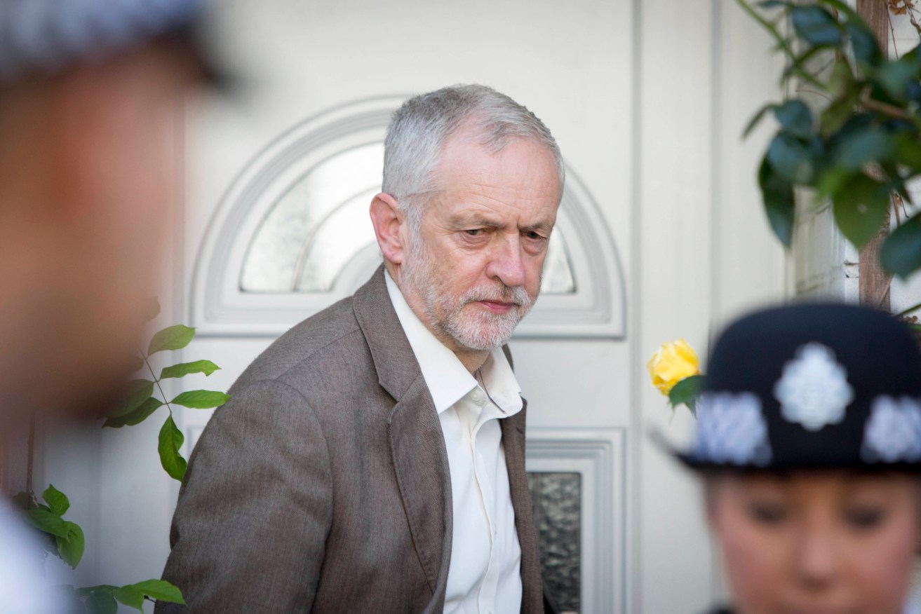 Labour Party leader Jeremy Corbyn leaving his home in north London before most of his MPs voted to oust him amid Labour's escalating civil war. Photo: Rick Findler, PA Wire.