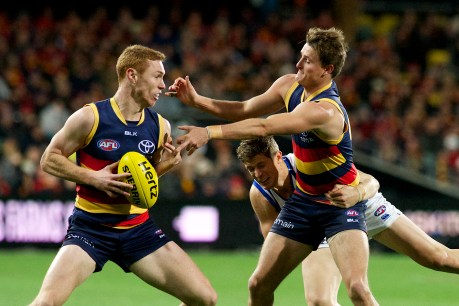 Crows confront goalkicking yips, an old mate and a solemn anniversary