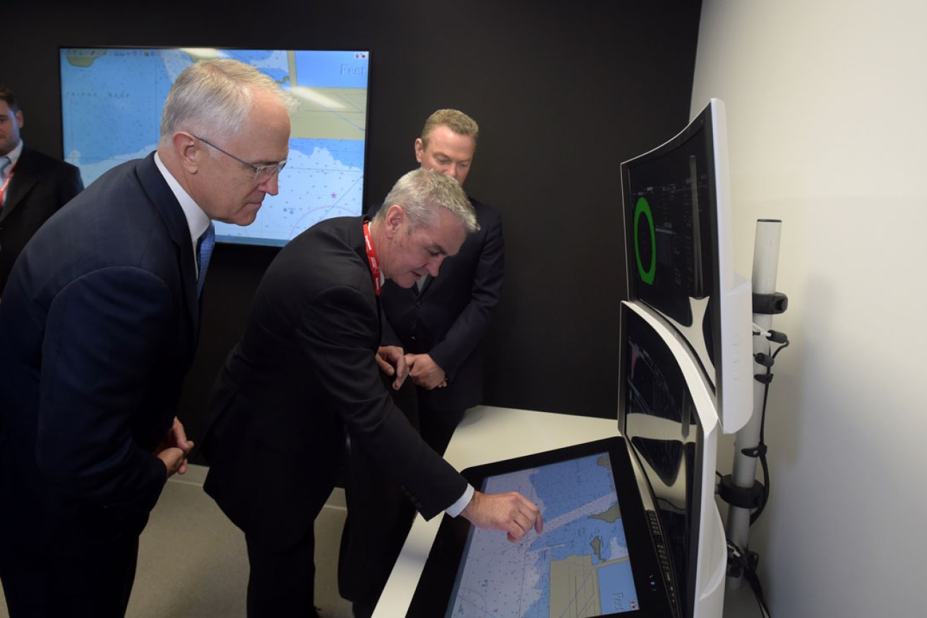 Malcolm Turnbull tours the Raytheon integration laboratory in Adelaide with Minister for Science, Innovation and Industry Christopher Pyne. Photo: AAP