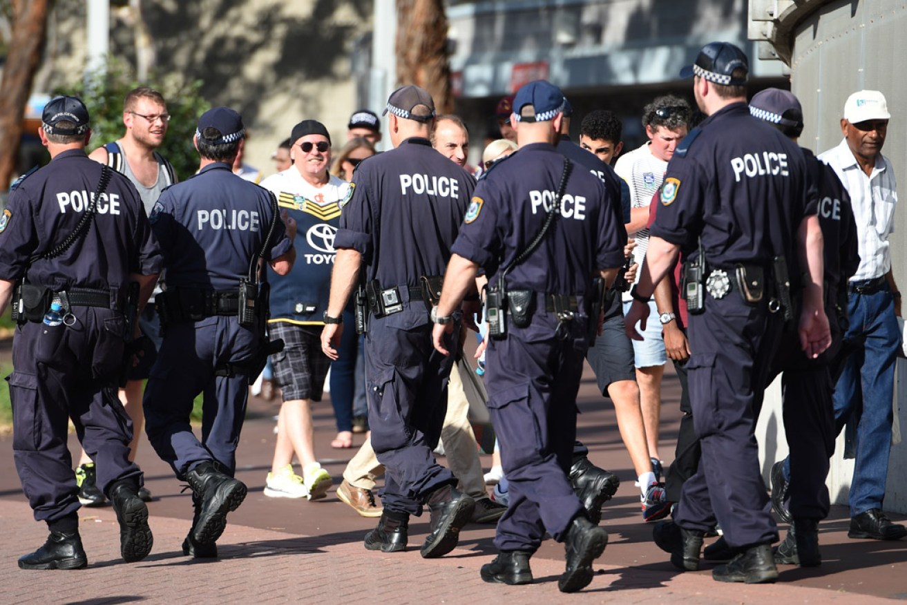NSW Police on patrol prior to last year's NRL Grand Final. Early reports suggest two 2015 matches are at the centre of a match-fixing investigation. Photo: AAP/Mick Tsikas