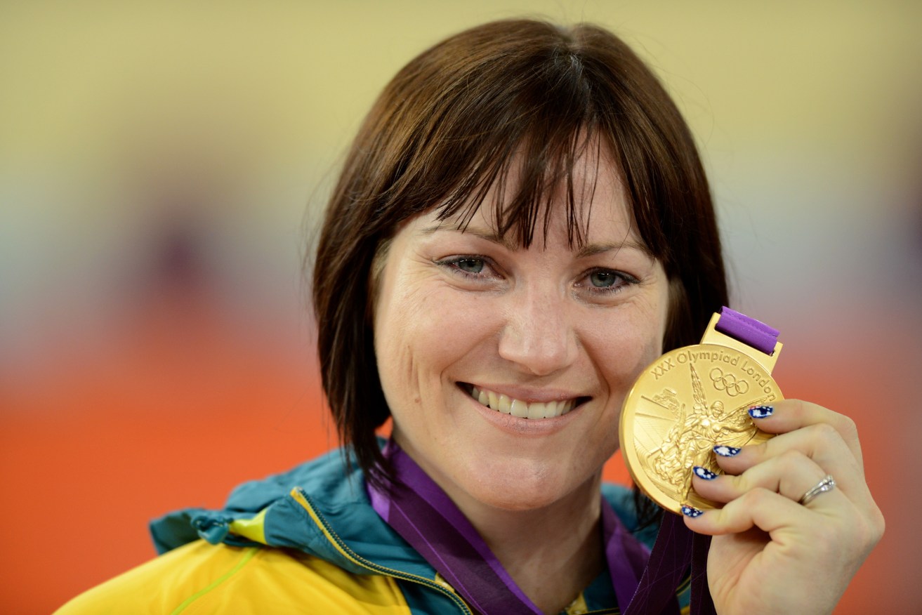 Anna Meares holds her gold medal after defeating Victoria Pendleton in the women's sprint during the 2012 Olympic Games in London. Photo: Dean Lewins, AAP.