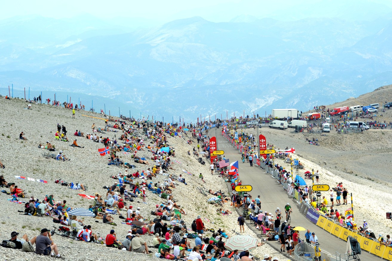 Cycling fans line the route near the summit of Mont Ventoux in the French Alps, in 2013. Photo: Tim Ireland, PA Wire.