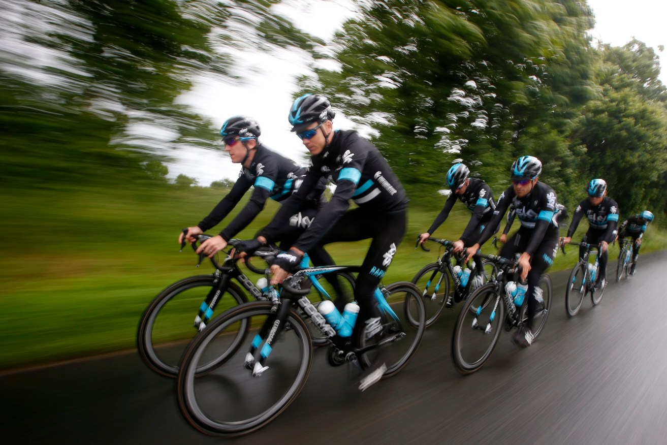 Team Sky's Chris Froome rides with teammates during a training session ahead of the 103rd edition of the Tour de France. Photo: KIM LUDBROOK, EPA.