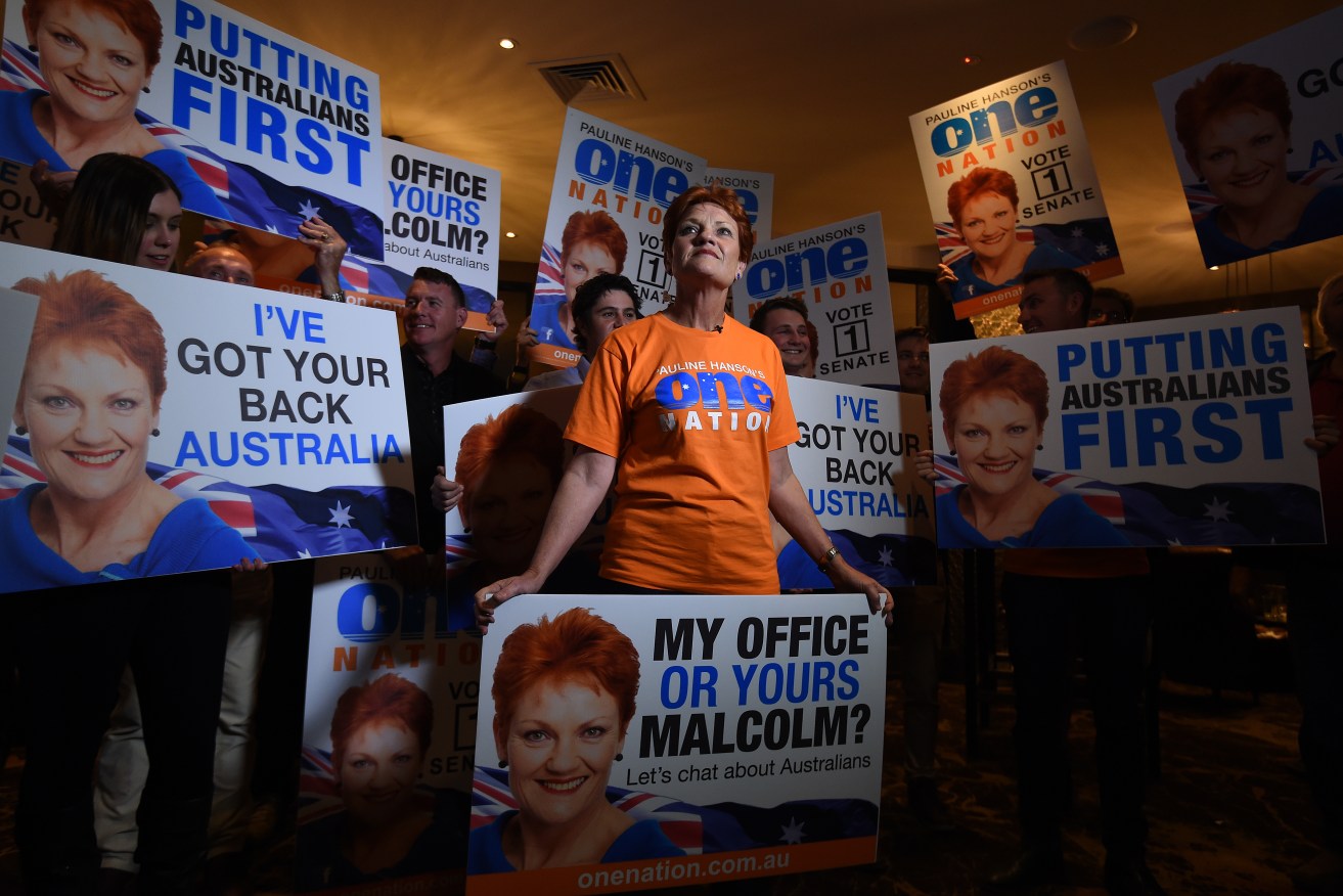 One Nation's Pauline Hanson looks on during a live television cross at her election-night function in Ipswich. Photo: AAP
