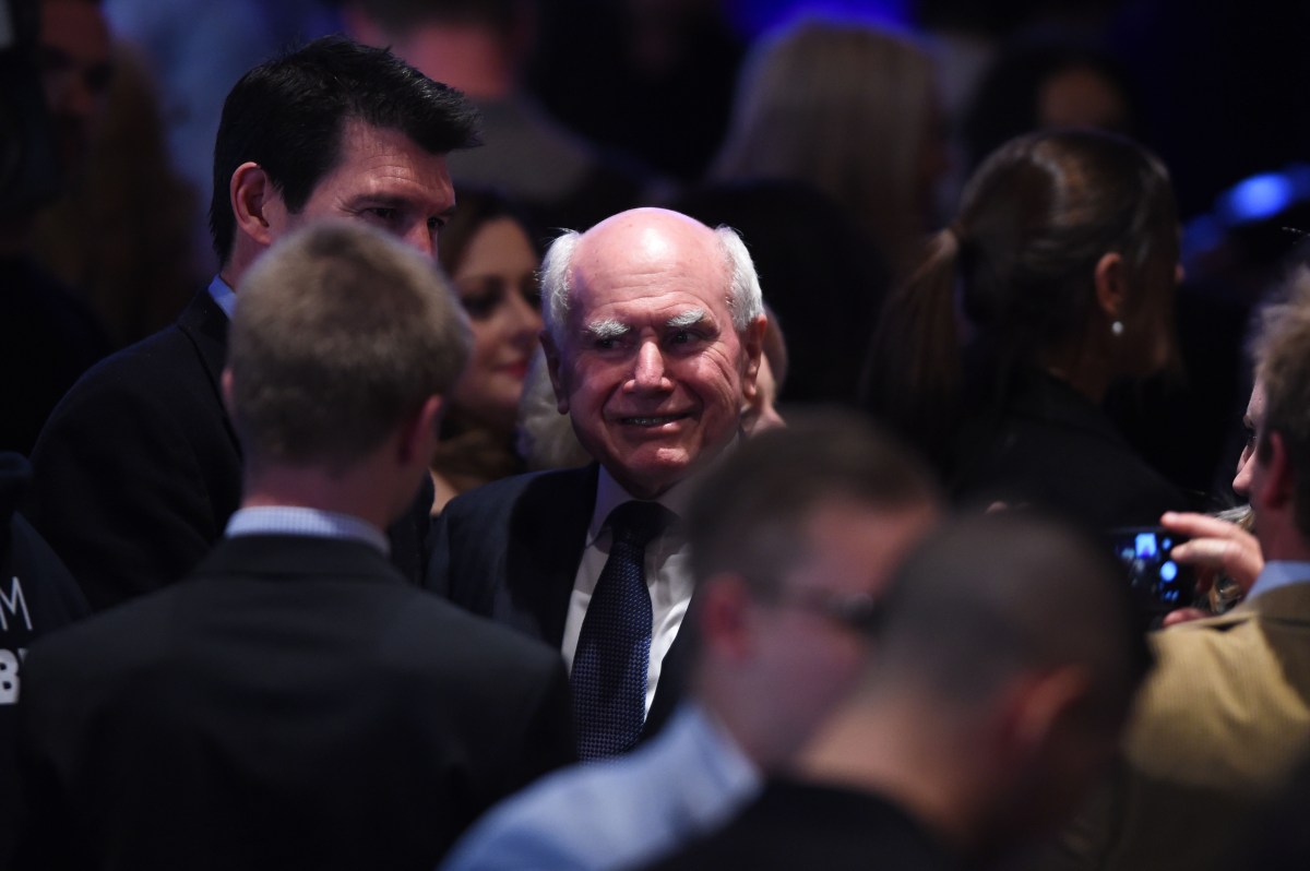 Former Australian Prime Minister John Howard is seen amongst Liberal Party attendees ahead of Australian Prime Minister Malcolm Turnbull address at the Liberal Party election night event at the Sofitel Wentworth Hotel, in Sydney, Australia, Saturday, July 2, 2016. The Australian Electoral Commission figures at 10.45pm (AEST) were showing the coalition holding 71 seats and Labor 68, with one Green and four independents with six seats remaining undetermined (AAP Image/Dean Lewins) NO ARCHIVING