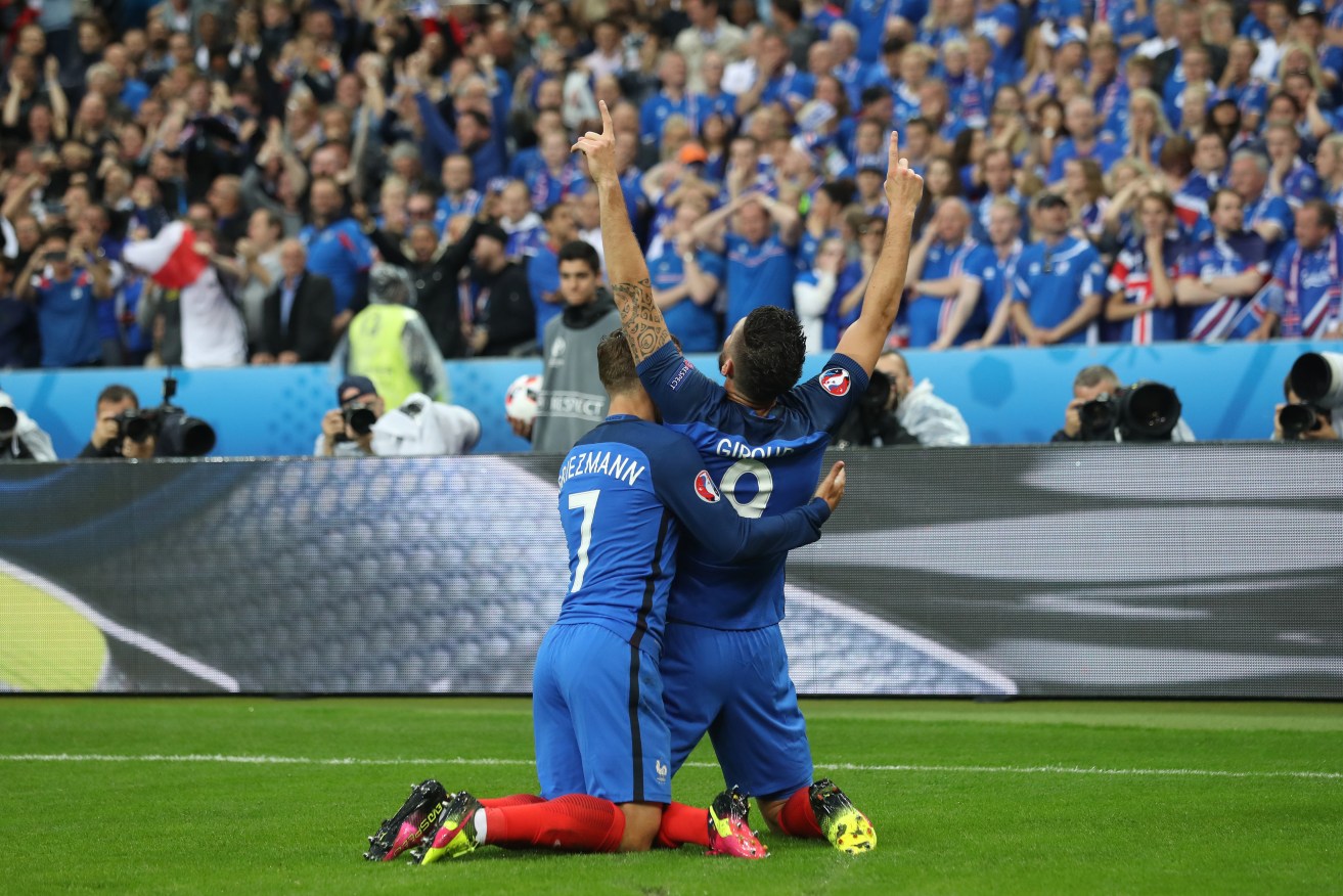 Olivier Giroud celebrates with Patrice Evra during France's drubbing of Iceland. Photo: David Klein, Sportimage/PA Images.