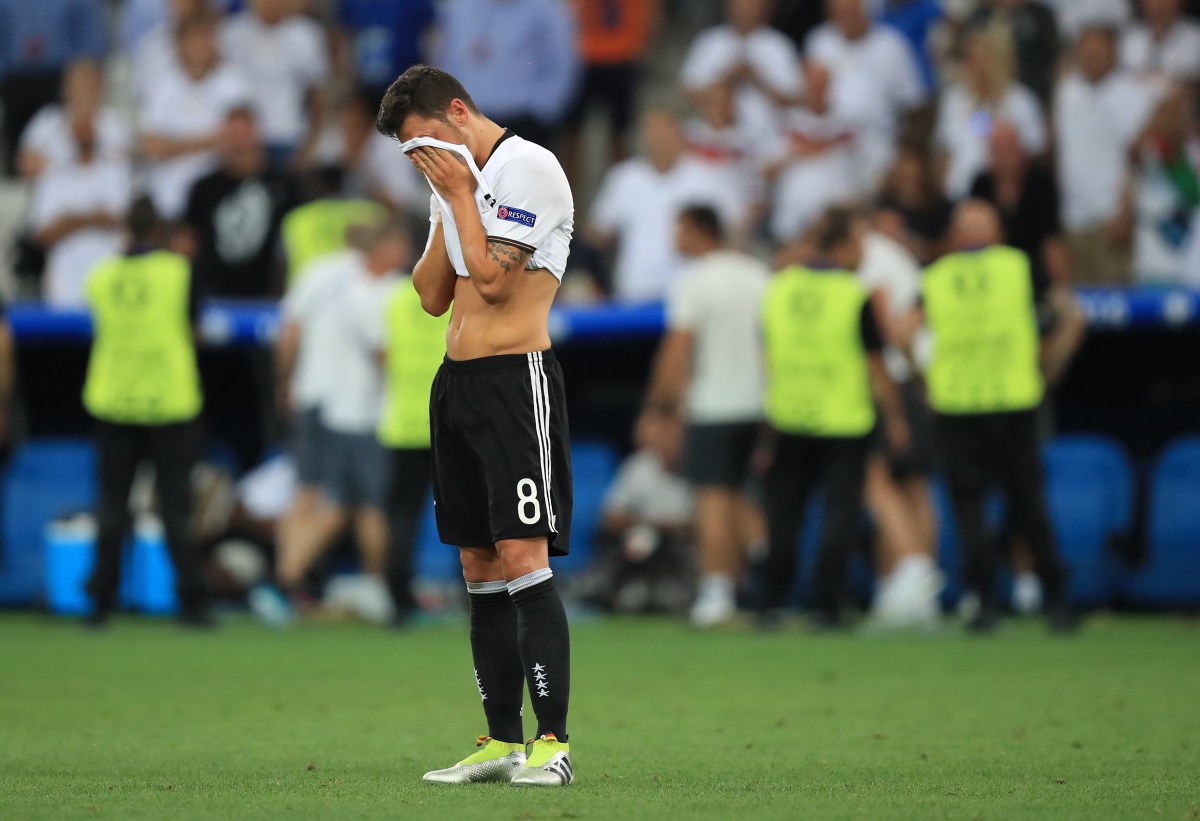 Germany's Mesut Ozil looks dejected after the game..