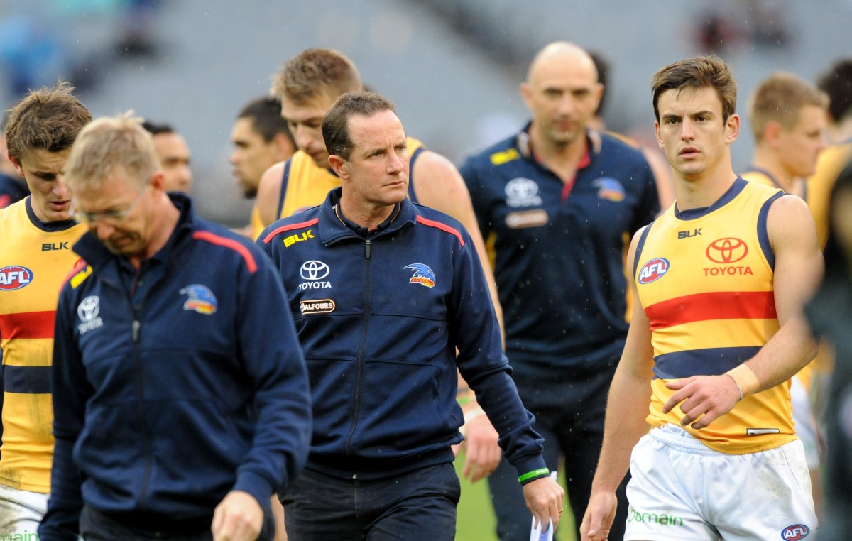 Adelaide Crows coach Don Pyke with his players at the break, during the AFL Round 16 between the Carlton Blues and Adelaide Crows, played at the MCG in Melbourne, Sunday, July 10, 2016. (AAP Image/Joe Castro) NO ARCHIVING, EDITORIAL USE ONLY