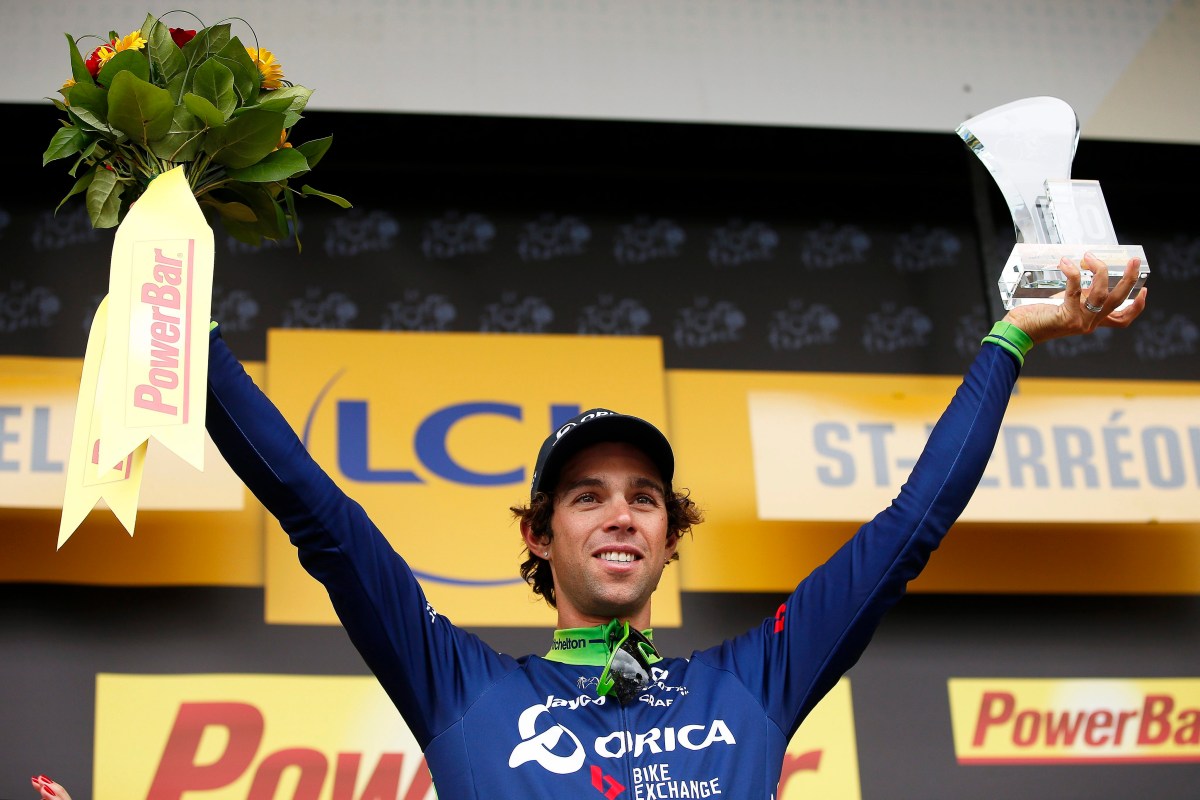 epa05421960 Australian rider Michael Matthews of the Orica BikeExchange team celebrates on the podium after winning the 10th stage of the 103rd edition of the Tour de France cycling race over 197km between Escaldes-Engordany and Revel, France, 12 July 2016.  EPA/YOAN VALAT
