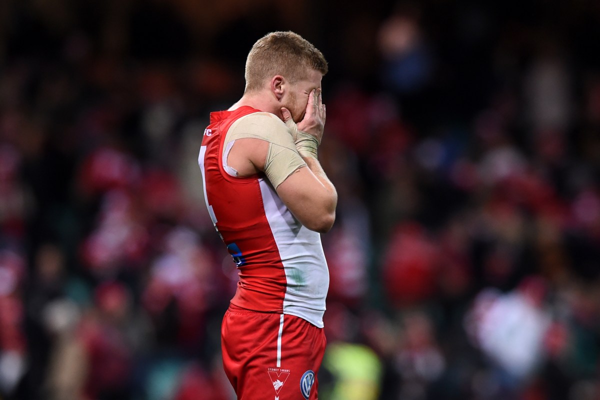 Dan Hannebery of the Swans reacts to their loss during the round 17 AFL match between the Sydney Swans and the Hawthorn Hawks at the Sydney Cricket Ground in Sydney on Thursday, July 14, 2016. (AAP Image/Paul Miller) NO ARCHIVING, EDITORIAL USE ONLY